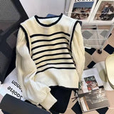 Black and white striped Sweater Vest with attached Sleeves